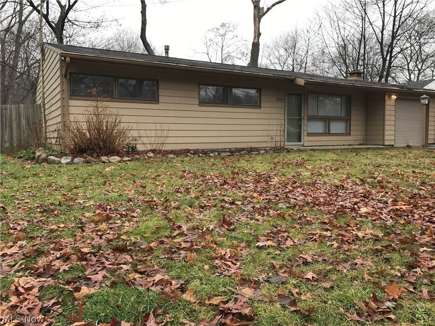 UPDATED, 3 BEDROOM RANCH (ALL FIRST FLOOR LIVING) WITH OVERSIZED 1-CAR GARAGE (21.5 x 11.5) AND DEEP FENCED-IN REAR YARD (72 x 240) ALL COMPLETE WITH COVERED FRONT PORCH, 21.5 x 11.5 BACK PATIO (6' PRIVACY FENCE) & ACROSS THE STREET FROM ADELL DURBIN ARBORETUM (PARK, PLAY AREA, TRAILS, TENNIS, ETC).  HOME FEATURES 15.5 x 11 FAMILY ROOM Q/COAT CLOSET, UPDATED TILED EAT-IN KITCHEN (STOVE, FRIG, DW, SINK), 11 x 10 DINING ROOM & 11 x 8 FIRST FLOOR LAUNDRY ROOM (NEW WASHER AND DRYER).  HOME INCLUDES 12 x 11.5 MASTER BEDROOM OVERLOOKING SERENE BACK YARD, 11.5 x 10 SECOND BEDROOM, 10.5 x 9.5 THIRD BEDROOM & TILED BATH IN BETWEEN (NEWER VANITY, SURROUND ETC).  ALL BEDROOMS HAVE GOOD-SIZED CLOSETS.  OTHER UPDATES INCLUDE:  C/A, INSULATED GARAGE DOOR, GARAGE OPENER, PAINT, ETC.  TRULY A GREAT PLACE TO CALL HOME.  ALL FIRST FLOOR LIVING, EASY MAINTENANCE AND IT IS LOCATED CLOSE TO ALL AMENITIES:  SHOPPING, EATERIES, ROUTE 8, ETC. STOW-MUNROE FALLS SCHOOLS.