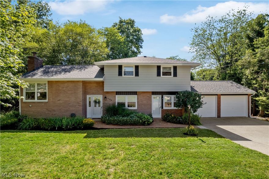 Have you been looking in Wadsworth for the ONE? Well this is IT!! Check out this meticulously maintained & beautifully updated split with attached in-law suite! This sprawling 4 level split level home has immaculate hardwood floors throughout the main part of the house, a completely renovated kitchen with soft close cabinets, skylight, & gorgeous new black Kitchen Aid appliances, living room with gas fireplace, fully updated bathrooms, bonus room with wood beams, and an another attached full living suite; complete with living room, bedroom, eat-in-kitchen, updated bathroom, laundry and it's own entrance! Other recent updates include: exterior house/deck professionally painted in June of 2022, NEW roof in 2021, hot water tank & both furnaces replaced within last two years! Did I mention the backyard? Mature trees, your own tire swing, and a great deck/patio. An amazing find in Wadsworth LSD. Come make this your home sweet home!