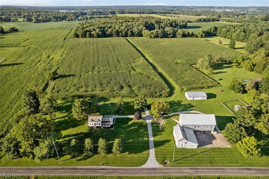 34-Acre Farm - Charming Updated Farmhouse - Shop - Barn - Open & Wooded - Organic Cropland - Country Views – Timber - Live Auction With Online Bidding Available. ABSOLUTE AUCTION, all sells to the highest bidder on location. ONLINE BIDDING BEGINS TUESDAY, OCTOBER 3, 2023 – 12:30 PM and AUCTION LIVE ON-SITE BIDDING WILL BEGIN FRIDAY - OCTOBER 6, 2023 - 12:30 PM.  Opportunity presents! 34-acre farm with charming updated 4-bed home. Nice mix of gently rolling farmland, pastureland, updated home, bank barn, shop, and wooded acreage with timber. A gem of southern Medina County. The main floor of the home features a kitchen with a breakfast nook, living area, master bedroom, full bath, and laundry. Refinished hardwood floors showcase the home's original character. The second floor boasts three additional bedrooms all with country charm. The property features many updates including a new aeration system, plumbing, A/C, electrical, vinyl siding, and much more. Front deck/porch with scenic views. Bank barn and 32’ x 60’ pole barn offer space for livestock, equipment, projects, storage, and/or business. Gently rolling, tillable farmland currently being farmed certified organic. Wooded acreage features current and future timber potential. Scenic country views surround! Property meticulously maintained. Truly a must-see property! Owner moving to family farmstead. Real estate is an investment you can enjoy. The property will be open for viewing on Monday, October 2nd, 4:00-6:00 PM.