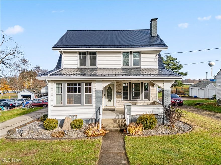 Don't miss your chance to call this charming 3BR colonial your own! Situated in the heart of East Canton, this lovely home offers all the charm of a historic property while also benefitting from numerous updates. Laminate floors flow through the main living area of the first floor. The oversized living room provides loads of natural light and direct access to the front sunroom area while the formal dining room gives additional space right off the kitchen. Speaking of which, newer appliances, solid surface counters, and a fantastic peninsula for seating give the kitchen both an updated look and modern usability. Head upstairs and you'll find three generously sized bedrooms and a full bath, all of which have seen updates over the years. The basement adds even more space thanks to a finished rec room and bar area and nature-stone style floors. It's not just the interior of the home that's worth talking about either! Outside the property features tons of curb appeal thanks to it's metal roof and low maintenance landscaping, perfect for enjoying warmer nights coming up on the front porch or large back deck. Parking isn't an issue either thanks to the concrete drive, two car car-port, and oversized two car detached garage. Schedule your private tour today!