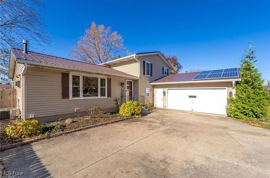 Attention house hunters: You might as well stick a FORK in it because you’ll be DONE after seeing this luscious listing on NORTHFORK. Yes, that’s right: Nestled in a cozy corridor of beautiful Brunswick Hills, this spectacular split-level boasts four bedrooms, two bathrooms, and a host of inviting features and updates. As you approach the 1900+ square-foot home (that is set on almost a third of an acre), you’ll notice that the oversized driveway and two-car garage provide the ideal setups for vehicles and storage. Upon entering the dwelling, you’ll find the radiant living room (which is so often illuminated with natural light beaming in through the front windows) to be just what you’ve always coveted. Take note of the fetching flooring throughout the home and the fabulous fireplace in the open dining area…talk about “hot.” Behold the dynamic kitchen with its inviting island, open cabinetry, amazing appliances, and cedar ceiling...can we say, “delicious”? The bathrooms are brilliant, and the bedrooms (with newer windows) are equally as impressive. Don’t forget about the lower “family” level with its new sliding door that opens to the back yard. Outside, you’ll discover a covered patio, an irrigated garden that is prepped with established asparagus, strawberries, mint, and garlic, and a fully-fenced-in yard. Add in a metal roof (2017) with 24 solar panels (which minimize your electric bill), a new hot water tank (2024), whole-home blown-in insulation (2020), a waterproofed basement (2021), and so much more, and there’s only one thing left to ask: When are you coming “home”?