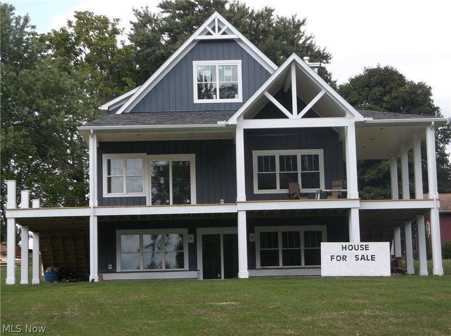 NEW BUILD ON PRIVATE WATERFRONT PROPERTY AT SENECA LAKE!  Here's your chance to own a brand-new home and enjoy the many amenities Seneca Lake has to offer!  The home's interior is not yet finished which allows you to make it your own.  The views from the large windows and deck are spectacular.  Items completed include water hookup, septic, electrical, plumbing, heating/cooling (propane FA/heat pump), hot water tank, propane tank, downspout drains, drywall (to be finished), and some lighting.  The exterior is mainly completed with the exception of lower patio, deck railing, and stone facade on poured basement walls.  Already plumbed for a hot tub and propane gas fireplace, has triple wall chimney for a wood furnace (if desired).  You'll get a feel for the house plans while touring to see the large living room and family room for entertaining, 4 bedrooms, 3 baths, many large closets, pantry, mudroom, utility room, extra suite above garage (5th bedroom), 24x26 garage, and pocket door desi