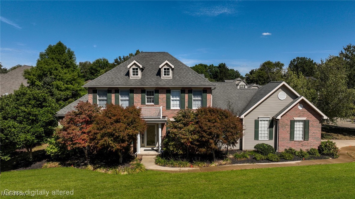 Lovely custom built brick home in sought after Century Village. This home offers the ease of a large first floor master bedroom suite that features a bath with Jacuzzi tub, separate shower, double sink, and walk-in closet. Beautiful, sunny kitchen with lots of built-ins, center island, large pantry, and dining area with access to the rear patio and fenced back yard. Stunning two story great room with fireplace and floor to ceiling windows. Spacious formal dining room with hardwood floors. First floor office. The second story features two large bedrooms with a Jack and Jill bath, huge cedar closet, and loft area with built-in desk/cabinetry. 2 car attached garage with second access to the basement. Separate single car garage with extra storage area. Neighborhood offers a HOA with lawn care services and snow removal. Quiet, convenient location close to restaurants, banking, shopping, and more. Everything you're looking for and more!