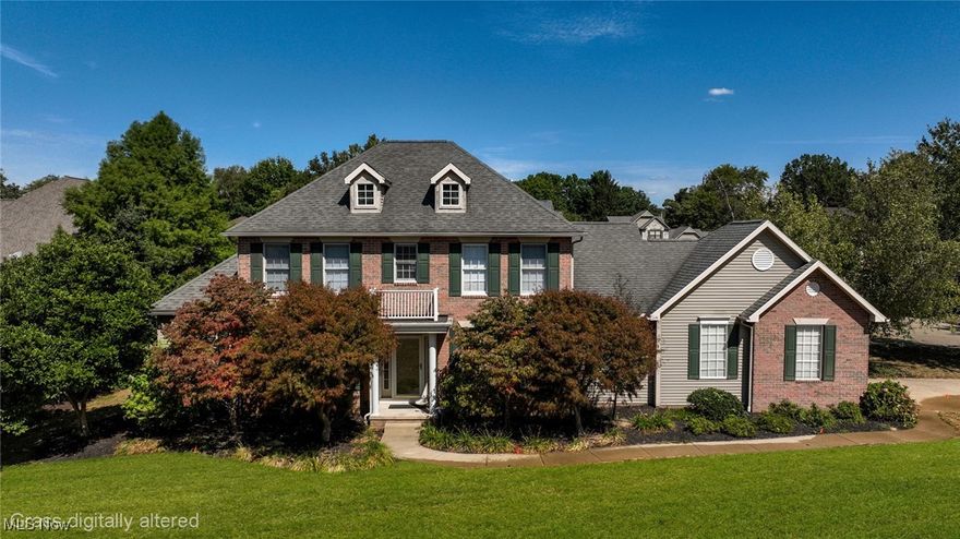 Lovely custom built brick home in sought after Century Village. This home offers the ease of a large first floor master bedroom suite that features a bath with Jacuzzi tub, separate shower, double sink, and walk-in closet. Beautiful, sunny kitchen with lots of built-ins, center island, large pantry, and dining area with access to the rear patio and fenced back yard. Stunning two story great room with fireplace and floor to ceiling windows. Spacious formal dining room with hardwood floors. First floor office. The second story features two large bedrooms with a Jack and Jill bath, huge cedar closet, and loft area with built-in desk/cabinetry. 2 car attached garage with second access to the basement. Separate single car garage with extra storage area. Neighborhood offers a HOA with lawn care services and snow removal. Quiet, convenient location close to restaurants, banking, shopping, and more. Everything you're looking for and more!