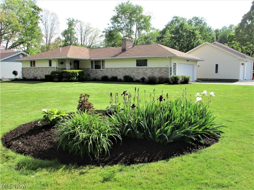 Spacious 3-4 bedroom ranch with 3 full baths / quality through-out/ Updated kitchen with appliances/ Updated baths/ rec room with fireplace and bar area/ 4th bedroom in basement with full bath/ 2 car attached garage plus a 3-car 36x28 detached garage built in 2007 - heated, full bath, 220 electric, wash bay with hot and cold water with full attic for storage with electric, 14x28 attached carport with floor and electric/ 2 sheds/ a must see!