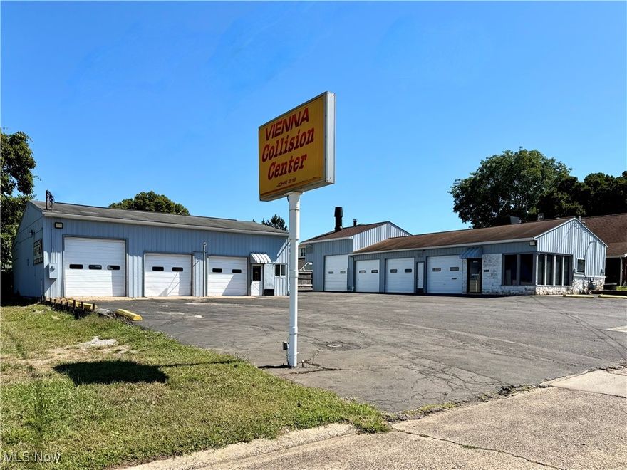 PREMIUM BUSINESS OPPORTUNITY with high traffic count and excellent visibility in Vienna, WV. Previously home to the Vienna Collision Center, this property includes two commercial buildings totaling approximately 4,500 sq. ft. The front building is 2,000 sq. ft. and features a down draft prep station, Spray Bake paint booth, office space, private restroom, and four overhead garage doors—accommodating up to 4 vehicles. The second building is 2,500 sq. ft. with three overhead doors and space for up to 8 vehicles. Both buildings have 220 electric service, tube heating, private restrooms, and are each equipped with their own air compressor. Ample on-site parking and great signage, make it ideal for auto-related businesses, service operations, and so much more. The location is easily seen from Grand Central Avenue providing easy access and traffic support from the other surrounding commercial businesses. Whether you're expanding your operation or launching a new venture, this property offers unmatched accessibility, visibility, and value. Let's take a look.