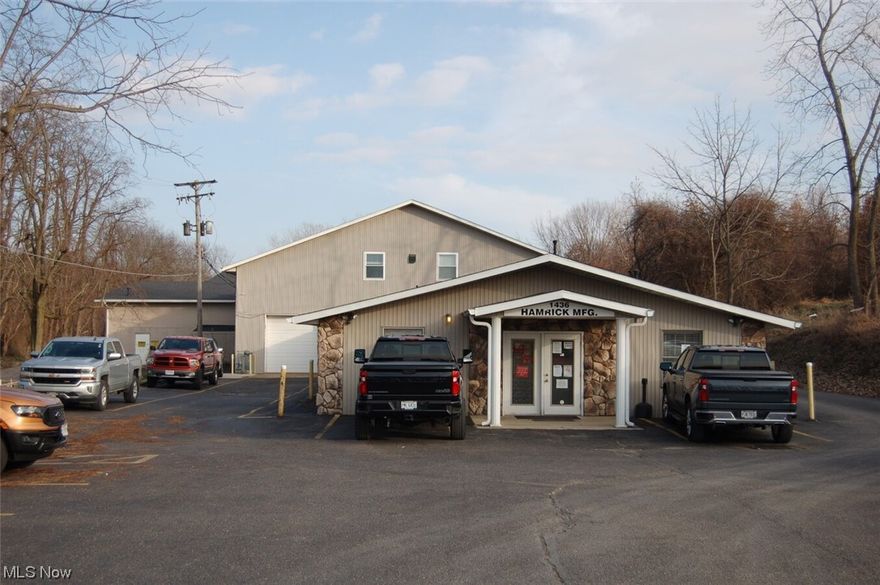 Outstanding building that has great opportunities and can be split into various uses. Home next door that would make a great private office. Electric fpr manufacturing and dock plus drive in bays. * restrooms in building and plenty of on site parking. This is a must-see property.