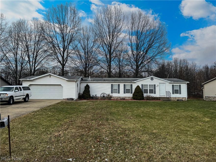 Spacious 3 Bedroom Modular Home located in a quiet neighborhood located in Alliance Ohio.  2-Car Attached Garage, Open layout with spacious rooms, and a nicely maintained exterior.  Cement Driveway, Large Yard, and shed for outdoor storage.  Force Air Gas Furnace, and A/C have been serviced and are in great condition. Great Location, Marlington LSD Call for your private showing today!