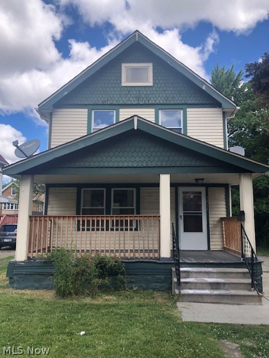 Cleveland Classic Colonial With Three Bedrooms. Could Be Owner Occupied Or Great Investment Opportunity. Large Front Porch .Formal Dining Room. Hardwood Floors and Woodwork Can Be Found Throughout. Some Newer Vinyl Windows, Newer Driveway and Newer Roof. Walk-Up Attic Area. Needs Some Updating To Bring It Back!