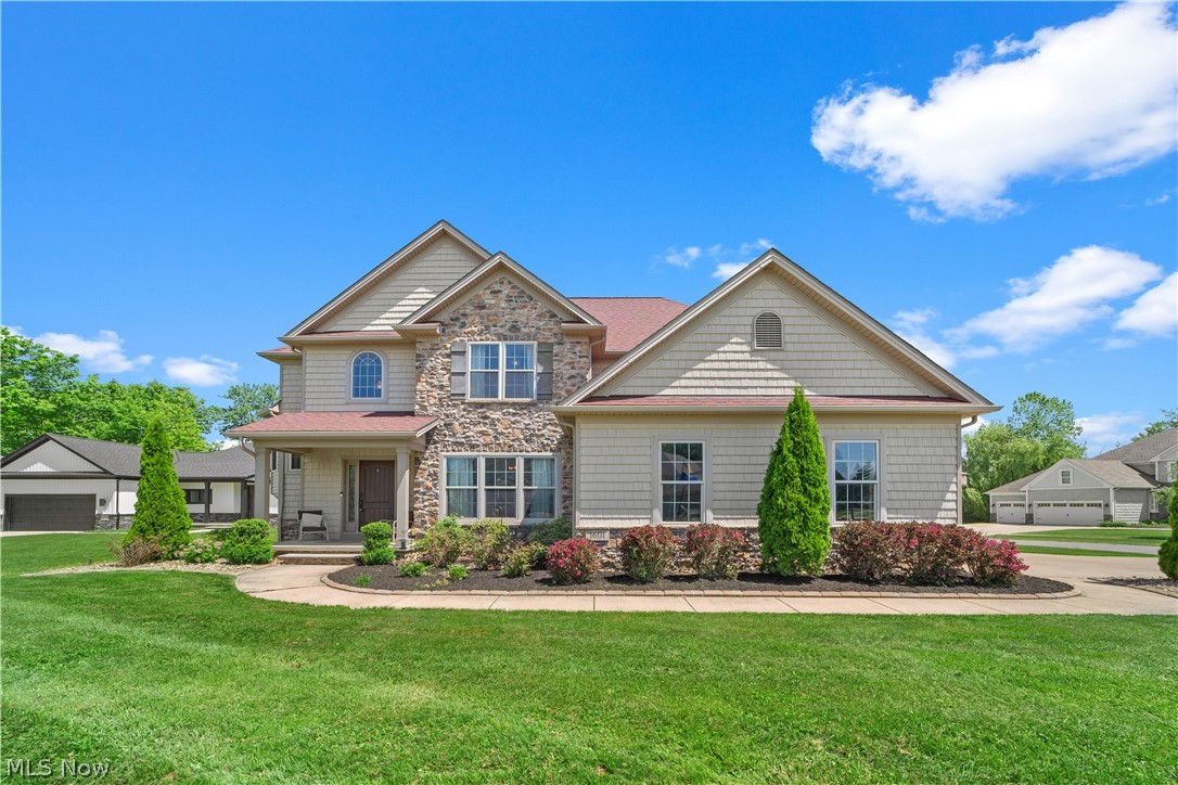 This beautiful home is in the sought-after neighborhood at the North Shore Estates of Lake Erie Shores.
This stunning residence offers a perfect blend of elegance, and comfort, promising a lifestyle of luxury and convenience.
Step into the inviting foyer, and enjoy the open-concept main level, entertain guests in the spacious formal dining room or unwind in the Great Room by the cozy gas fireplace.
The gourmet kitchen is a chef's delight, featuring granite countertops, stainless steel appliances, and ample cabinetry, complemented by bar-style seating and a convenient pantry.
The main level also features an oversized mudroom, a well-appointed laundry room, and an updated half-bath for convenience.
Upstairs, retreat to the sizable Owner's Suite with hard surface flooring, dual walk-in closets, and a spa-style en-suite bathroom featuring a ceramic-tiled walk-in shower and a rain shower.
Three additional bedrooms, a full bathroom, and a versatile loft area complete the upper level, offering ample space.
The lower level is an entertainer's paradise, with a recently updated bar area, a cozy media/living room, and flexible spaces perfect for an additional guest room, office, or bonus room. A full bathroom and plenty of storage ensure comfort and practicality for everyday living.
Outside, enjoy the charm of the cozy front porch, the spacious side yard, and access to a private beach a few steps away at Lake Erie Shores, with an attached 3-car garage and ample driveway parking. This is the opportunity to make this extraordinary property your own. Don’t miss out—schedule a viewing today!