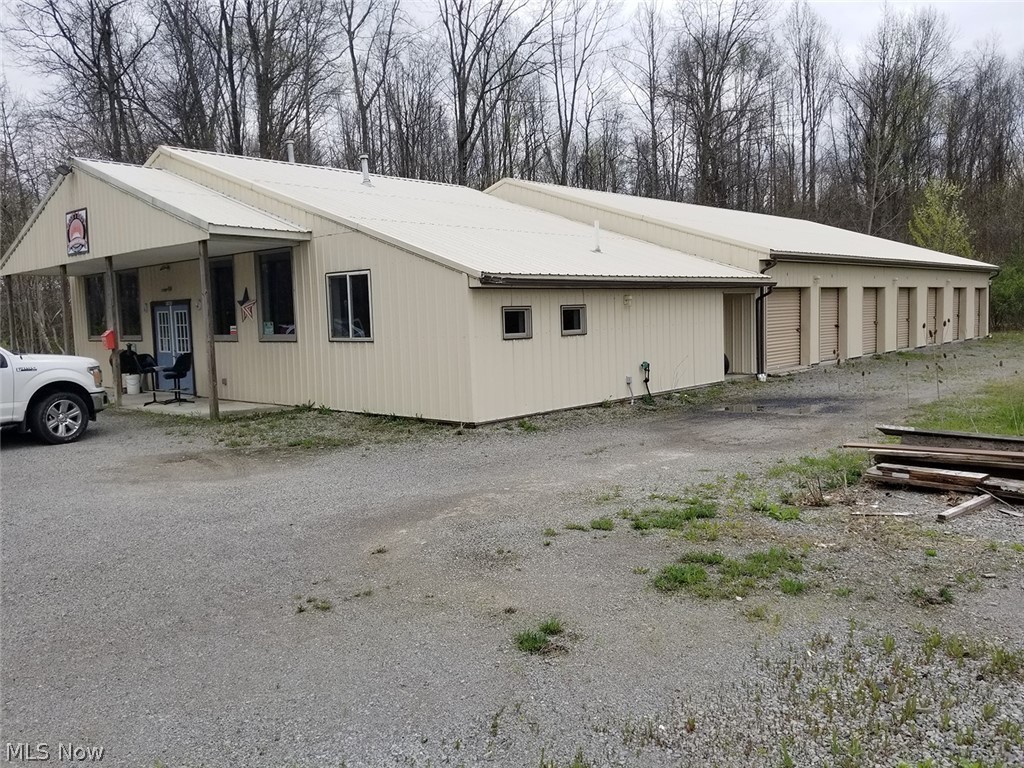 13 Acres With Storage Lockers & Commercial Business Storefront - Offered In 2 Parcels – Nicely Wooded - 8-Acre Tract – No Zoning – Unity Twp. – 2 miles From Firestone Farms On SR 14 - On-Site And Online Bidding Available - ABSOLUTE AUCTION, all sells to the highest bidder(s). ONLINE BIDDING BEGINS TUESDAY – JUNE 21, 2022 – 12:00 PM and AUCTION LIVE ON-SITE BIDDING WILL BEGIN THURSDAY – JUNE 23, 2022 – 5:30 PM. Features 13 acres total. Former fireplace shop. 1,560 SF with half bath adaptable to any business. The property includes 52’x71’ storage lockers with (14) 10’x25’ units, mostly all rented at $70-$75 per month. Billboard on the property with lease to transfer. Commercial septic and drilled well. The property will be open for viewing one hour prior to the auction. Parcel #1: Approx. 5 acres with storage locker building and commercial storefront. Approx. 293’ frontage. Parcel #2: Nice 8 acres, wooded with marketable timber. Excellent spot for a new home. Approx. 50’ frontage hideawa