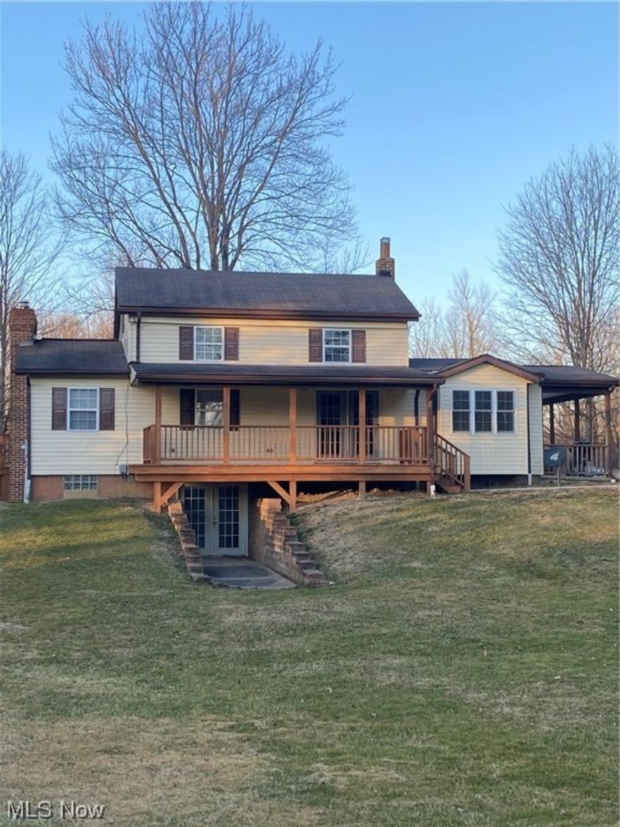 Welcome to 2376 Johnnycake Rd, a beautiful 2 bed, 2 full bath home situated on 2 acres! Totally remodeled in 2001 and many updates since. So much living space on first floor w new flooring and paint throughout, new light fixtures, new stackable washer/dryer, new walk-in tub on main floor. Kitchen is fully applianced, has hard surface countertops and gorgeous cabinetry. The dining room offers French doors that lead out to the deck, living space w wood beamed accents and wood burning fireplace. Washer/dryer hookup on main floor and in walk-out basement. Upstairs you'll find the 2nd updated full bath & 2 nicely sized bedrooms. Home updated w 300 amp electrical service. And of course outside is a 4-car heated garage, perfect for the car buff or collector of treasures. Make this your dream home with a little slice of country heaven! Property being sold "as is".