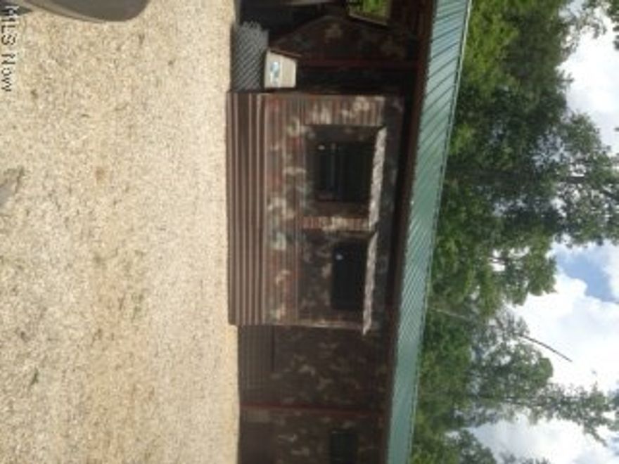 Hunting camp, tree stands, outhouse. 1994 Coachman Camper. Nice covered decking. Fully furnished including deck furniture, mower, generator. Borders Wayne National Forest. Wildlife Abundant.M870 JG