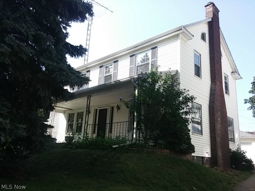 Looking for that special house to WOW your friends and family?  Let this old beauty be everyone's envy with its original rich woodwork, grand foyer and staircase which leads you upstairs to the three large bedrooms, one with cozy window seats, and full bath.  The formal dining room and nice sized living room with fireplace, will be the perfect place to host family gatherings.  Newer windows on the second floor, glass block windows in the basement, huge attic that could be finished and nice two car detached garage are all added bonuses.  Bring this house back to the stunner it used to be!!