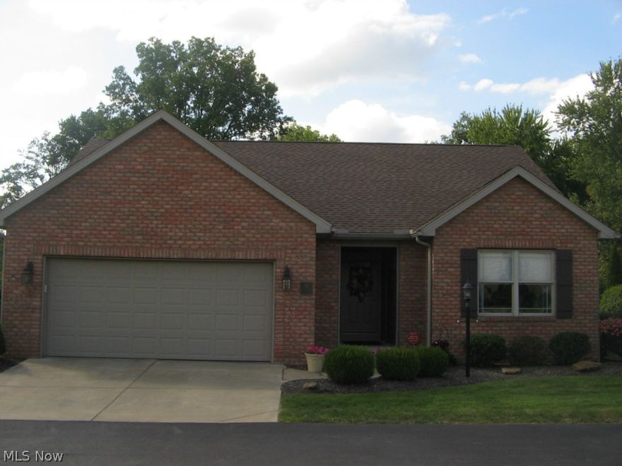 Amazing 2 bedroom 2 bath villa. Home features great room with gas log fireplace. Great room allows for adjacent formal dining area. Eat in kitchen highlights granite counter tops and backsplash complimented by ceramic flooring. Nutmeg handcrafted alder wood cupboards. Bright and airy sunroom.  Freshly painted bedrooms, baths, kitchen, laundry area and deck in Spring of 2015.  Deck offers ceiling fan and blinds. Nearby patio for added seating area and entertainment.  Garage floor has rubber tile.  Separate entrance from garage to basement as well as entrance from garage to laundry area. Cold water in garage.   50 year warranty shingles on roof in 2012-2013. Extra insulation added to villa along with insulation added to  garage in May of 2015. Howland Alarm $23 mo. 
Common areas with Bocce Court and stocked fishing area.