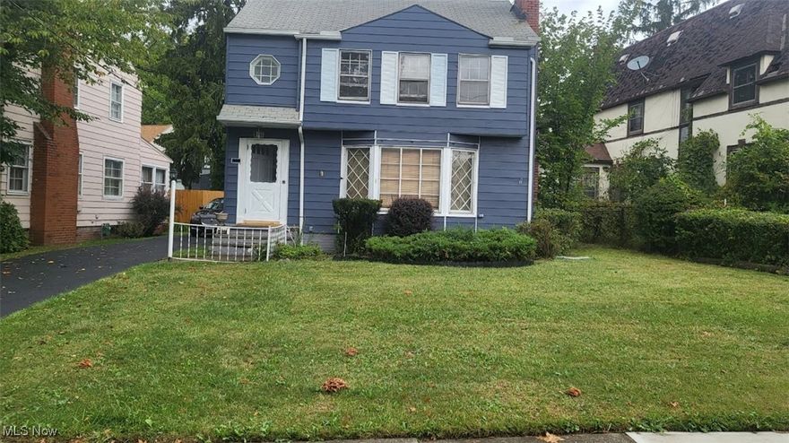 This home is freshly painted in and outside with a new paved driveway and the roof has new gutter guards. There are hardwood floors throughout the home and new carpet in one of the bedrooms with a walk-in closet. The master bedroom has a double walk-in closet. There are 3 bedrooms and 1 full and a half bath. The bedrooms, dining and living rooms have built in wood shelving. The home offers a cozy dining room and a refinished kitchen with stainless steel appliances and self-clean oven with the dishwasher. The living room offers a wood burning fireplace.  There is a laundry room with a laundry chute in the newly carpet finished basement with a wet bar and an office and storage room. There are ceiling fans throughout the home along with new lighting in the hallway staircase. The plumbing and electrical is updated all throughout the home.  There is a cozy sunroom with a pet friendly door with a fenced in backyard with outside decorative night lighting outside of the home. The home is sold "as is" and ALL reasonable offers are welcome.  Don't delay schedule your showing today!