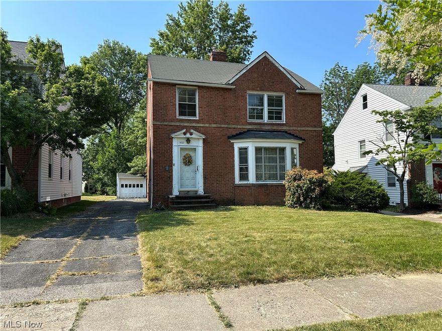 Amazing opportunity to own a beautiful 3 bedroom brick colonial with a 2 car garage in highly desirable University Heights. Hardwood floors throughout, enclosed rear patio, and partially finished basement with a bar area. Needs a little TLC. You really won't want to miss out on this one!