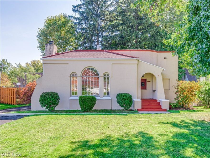 Bright and Spacious rooms greet you in this Mediterranean Style Ranch home!  Beautiful Fan window and high ceilings in the large Living Room with Fireplace.  Enjoy the big Dining room to entertain, which opens up to a nice Sun Room to have your morning coffee.  Kitchen has plentiful cabinets.  Hardwood floors and Ceramic tile through much of this home.  Mostly replaced windows throughout.  Recently updated roof- garage and house shingles were replaced, main flat roof was not, gutters were replaced.  Basement has been waterproofed with transferrable warranty. Basement has also been plumbed for a 2nd bathroom. Private Backyard, and Garage too.  You're going to love living on lovely Chestnut Blvd with some of the prettiest homes in Cuyahoga Falls.  You'll be close enough to walk to events, restaurants and breweries in Downtown.
Hurry on in.