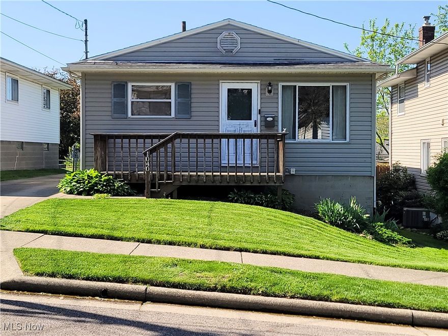 Don't miss out on this charming 3 bedroom ranch in Akron!  There is a wonderful fenced in back yard to relax in after those busy days or enjoy sitting back with a cup of coffee on the welcoming front porch.  This cozy bungalow includes a nice eat in kitchen and bedrooms with hardwood floors.  The basement has been partially finished and can be used as another living area, playroom for the kids, or an amazing craft room!  Don't miss the chance to make this home your own! Schedule a showing with your favorite realtor today!
