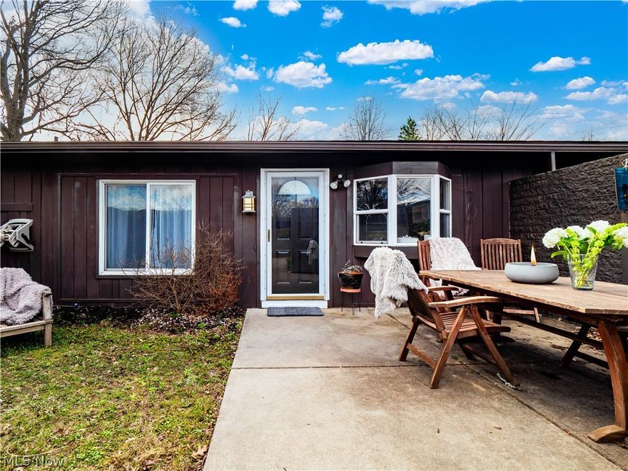 Location, location, location! Don’t miss this exclusive opportunity to own an adorable, well-maintained condo in the heart of Berea, a quick bike ride to the Cleveland Metroparks, downtown Berea, and right on the border of Strongsville—giving you easy access to shopping, dining, and everything you need.  Pull up and you’re immediately welcomed by a private, fenced-in front courtyard featuring a spacious patio ideal for relaxing or entertaining, plus a grassy area to enjoy your own green space.
Step inside this adorable, updated condo to an updated kitchen showcasing black-stained cabinetry, subway tile backsplash, and newer appliances including a 2025 refrigerator, stove, and microwave. A charming bay window fills the space with natural light, highlighting the abundant cabinet and counter space for the gourmet chef.  Across from the kitchen, the main living area has been refreshed with brand new carpet and fresh paint—perfect for cozy nights in or hosting guests, complete with a built-in sound system for the ultimate vibe.  The primary bedroom is spacious enough for a king-sized bed and features fresh paint, updated lighting, and a full wall of closets for excellent storage. The second bedroom offers impressive built-ins, a walk-in closet, and a sliding glass door that open to additional green space and natural light.  The bathroom includes a walk-in shower and updated vanity. A one-year home warranty is included for added peace of mind.  Opportunities like this—an updated, move-in ready home under $200,000 with low HOA—don’t come around often. Schedule your showing today!