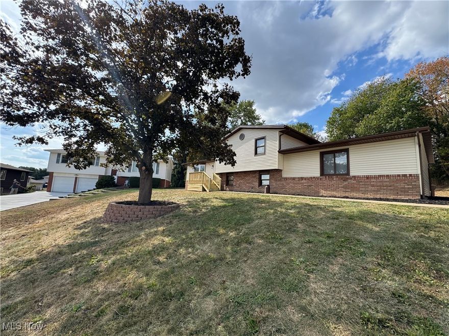 SELLERS ARE OFFERING UP TO 1% INTEREST RATE I YEAR BUY DOWN (SEE SUPPLEMENTALS) No detail has been missed in this 3 bedroom 2 full bathroom 6 car garage 4 level split in Perry Schools. This home has been Completely updated and renovated. Welcome your guests onto the new front porch and into the open concept living room, dining room and kitchen. So much natural light floods this space through the large front bay window and the new sliding doors. The kitchen is new including all new custom cupboards, new quartz counters and beautiful Range hood and state of the art stainless steel appliances. The dining room has direct access to the backyard through the new sliding doors and onto the new deck. Up a few stairs to the 3 bedrooms and a all new main bathroom. You will love the large vanity with double sinks and the custom tiled tub and shower. Down the the 3rd level is a large family room. A great place for entertaining and/or family hang out space. Another completely updated full bathroom and the laundry room /Mud room finish off the 3rd level. There is a 4th level, great for storage and utility. The outside of this home is just as lovely. sitting on the end of the cul de sac this home has great curb appeal. You will be proud to call it home. There is a separate 20 x 40 outbuilding/Garage. Perfect for the car enthusiasts or for setting up your own shop. So many updates, including NEW Furnace, NEW AC, New Sump Pump, New Kitchen, New Bathrooms, New doors, New Deck, New front porch. All new flooring, lighting and paint. Nothing to do but move in!