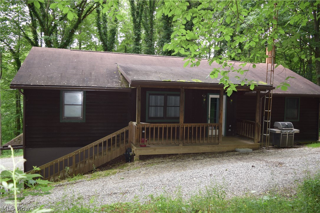 If you are looking for complete privacy this is the home for you. Nestled within 3.95 acres this home cannot be seen from the roadway. This home is completely surrounded by trees giving you complete privacy, in fact, no one would even know that there is a house here. On the main level, the home has an open concept that features the living room, dining room, and kitchen. On this level, you will also find three bedrooms and one full bathroom. On the finished lower level you have a family room with a fireplace that has a door that exits out to the backyard; a second full bathroom and a utility room. There are views of the wooded acreage from every window. The spacious two-car garage has extra room for storage and there is a storage shed as well. Many species of trees and wildlife fill this property. More pictures coming soon.