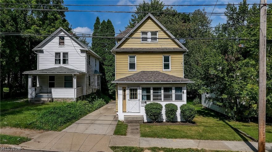 421 E Thornton St Akron, OH 44311 is a 3-4 bedroom colonial close to everything Akron has to offer. This spacious home includes a finished attic that could be a 4th bedroom, home office, playroom, study room or simply storage. The front porch is enclosed allowing you to enjoy the sun throughout the year and offers a great place for plants and quiet time! Inside you will find a large living room, dining room and kitchen on the first floor with lots of cabinets, built in window seat and corner cabinet for dishes. Upstairs on the 2nd floor there are 3 bedrooms & newly renovated bathroom including a tub & shower combination with a large additional closet and then the finished 3rd floor with plenty of flexible uses. This home has wood floors on the 1st floor and vinyl plank wood look flooring throughout the 2nd floor. The original natural oversized trim is beautiful and true to the era. The basement includes the washer and dryer hookup and was just painted so nice and bright. The interior a