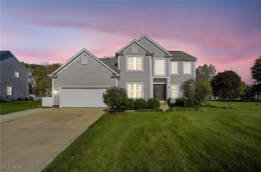 Welcome to this beautifully updated colonial in the Hannum Crossing community of Streetsboro. Set on just over a half
acre, this 5-bedroom, 3.5-bath home blends classic comfort with modern style and thoughtful upgrades throughout.
Step into the two-story foyer, where an updated front door and warm natural light create an inviting first impression.
The main level is designed for everyday living and easy entertaining, featuring a private home office or den, formal
living and dining rooms, a convenient half bath, and first-floor laundry. The vaulted family room with a gas fireplace
opens seamlessly to the kitchen and out to your backyard retreat. Upstairs, the primary suite impresses with vaulted
ceilings, a remodeled bath with a walk-in shower, and a spacious walk-in closet. Four additional bedrooms are bright,
comfortable, and well-sized. The finished lower level adds over 600 square feet of flexible living space, complete with a
full bath, optional bedroom or gym area, and a large storage room. Step outside to an entertainer's dream with a
covered deck featuring a steel roof, a stamped concrete patio, a concrete basketball court, a shed, and a 7-person hot
tub - perfect for relaxing or hosting year-round. Recent upgrades include newer windows, refreshed flooring, a water
softener, furnace, central air, and hot water tank. Ideally located minutes from I-80 and I-480 and just 10-15 minutes
from Kent State University, this home offers the perfect balance of convenience, space, and style near Tinker's Creek
State Nature Preserve, local parks, golf, shopping, and more. Don't miss your chance to make this exceptional property
yours - schedule your private showing today.