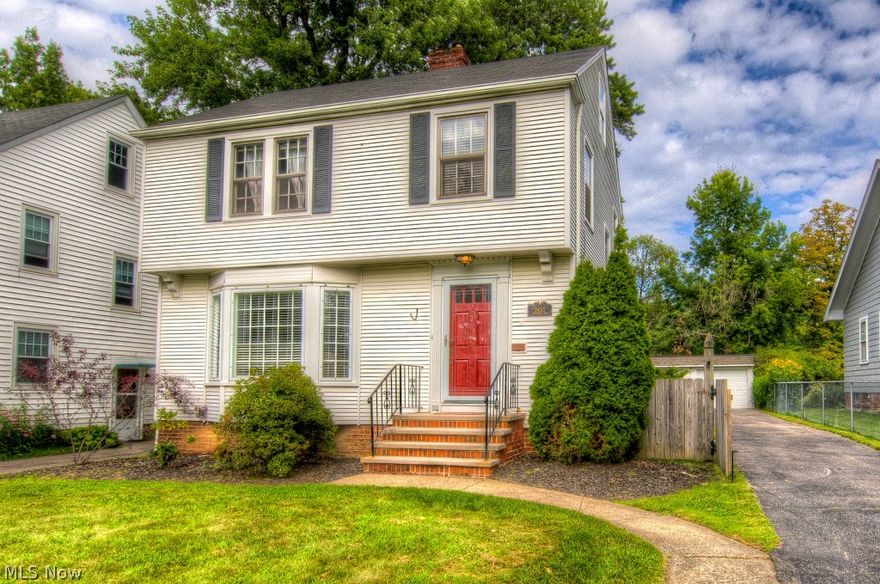 Charming Colonial on Desirable Street in Cleveland Heights! ***Check out the 360 Degree Panoramic Virtual Tour!***Spacious Living Room with Hardwood Floors, Fireplace, and Bayed Window! Formal Dining Area with Built-In Shelving and Hardwood Floors! Large Family Room Addition! Updated Kitchen with Newer Flooring, Countertops, Cabinets, and Custom Tiled Backsplash! Darling Renovated Half Bath on First with Pedestal Sink! Three Spacious Bedrooms on Second Floor! Remodeled Full Bath on Upper Level Complete with Newer Flooring, Fixtures, and Tile Work! Expansive Lower Level Rec Room with Fireplace! Updated Throughout with Today's Colors! Fenced in Yard! Walkable to Canterbury Elementary, Shaker Lakes, Horseshoe Park, Gigi's, On the Rise, and Much More! Minutes from University Circle, Hospitals, and Colleges! Home Warranty Included!  Call for your Private Showing Today!