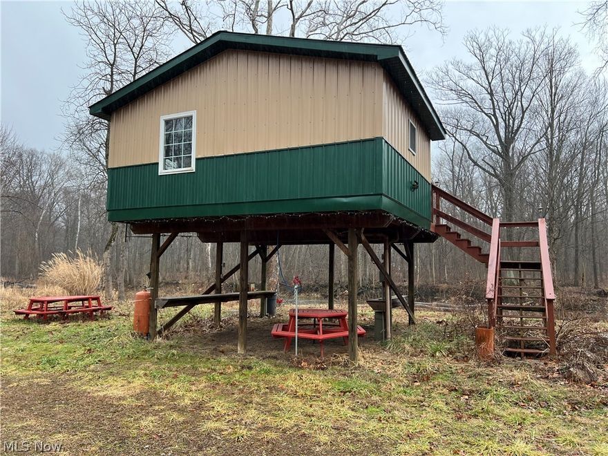 Discover an exceptional opportunity to own 11.27 acres of picturesque riverfront land along the scenic Vermilion River in Wakeman, Ohio. This rare property offers approximately 1,300 feet of direct river frontage, providing unparalleled views, recreational access, and the tranquility of nature just minutes from everyday conveniences.
The parcels feature electric and water utilities readily available at the street, simplifying development plans. The front parcel is confirmed buildable, with a completed soil test already in place—ideal for constructing your custom dream home or expanding existing improvements.
Nestled on the property is a charming 1-bedroom, 1-bath elevated cabin built in 2016, perfectly positioned to overlook the flowing Vermilion River. The cabin includes electric and water service, plus a convenient wood storage shed for outdoor gear and firewood. It features a waste holding tank, making it ready for immediate use as a weekend retreat, guest quarters, or temporary residence while you build.
The Vermilion River, a beautiful tributary known for its natural beauty, fishing opportunities (including steelhead trout in season), and peaceful surroundings, borders this land, offering endless possibilities for kayaking, fishing, wildlife viewing, or simply relaxing by the water's edge.
With plenty of space to create your private oasis—whether a spacious family home, recreational compound, or investment property—this holding combines rural serenity with practical infrastructure and existing amenities. Don't miss this chance to secure prime riverfront property in a desirable area of northern Ohio.
Contact for more details, showings, or additional information on this unique Vermilion River gem!