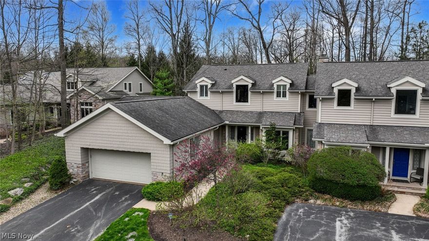 This exceptional 3-bedroom, 3.5-bath home in Richfield’s highly sought-after Glencairn Forest blends elegance, comfort, and thoughtful design in every corner. Located in the peaceful Glencoe Clusters on a quiet cul-de-sac, this home is surrounded by serene, wooded views and features a private patio and two decks for relaxed outdoor living. Step inside and prepare to be impressed by the dramatic two-story living room. With a soaring ceiling, a wall of windows that floods the space with natural light, and a stunning stone-accented fireplace flanked by custom built-ins, it’s the heart of the home and a perfect space for both cozy nights and grand entertaining. The open, dinette area connects to a beautifully appointed kitchen with stainless steel appliances and garden views. A formal dining room adds sophistication for special occasions, while a cozy study with custom bookshelves and plantation shutters offers the perfect quiet retreat. The first-floor primary suite offers privacy and comfort with its own deck, a spa-inspired en-suite bath with heated floor, and a spacious walk-in closet. Upstairs, you'll find two generously sized guest bedrooms, a full bath, and a bright, airy loft/studio area that invites creativity and flexibility. Downstairs, the fully finished lower level is exceptionally done—offering high-end finishes, a full bath, and ample space for a home gym, and media room. Additional highlights include an oversized 2 car garage with durable Nature Stone flooring and built-in storage, a large first-floor laundry room, a Radon mitigation system along with a whole house generator ensures uninterrupted comfort and peace of mind.