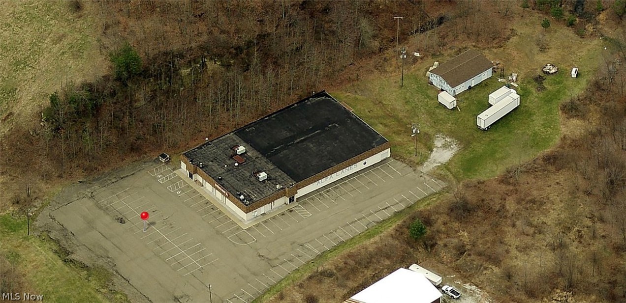 Rare Opportunity! 4 Acres Zoned Commercial - 90 Minutes To Cleveland, Pittsburgh, Columbus - Public Utilities – 3-Ph. Elec. - US-36 Exposure - AKA Alpa Lanes - Owner Retiring - Complete Dispersal of Bowling Alley - Uhrichsville - Online & Onsite Bidding Available. ABSOLUTE AUCTION, all sells to the highest bidder(s).
ONLINE BIDDING BEGINS MONDAY – APRIL 19, 2021 – 12:00 PM and AUCTION LIVE ON-SITE BIDDING WILL BEGIN FRIDAY - APRIL 23, 2021 - 12:00 PM, REAL ESTATE SELLS FIRST. Real Estate: 4 acres with good elevation and convenient location. Located just off route US-36 adjacent to US-250 and OH-800. Multitude of uses. Large aggregate parking area. To be offered in 2 parcels. PARCEL #1: 2.6 acres w/ a 96’ x 158’, 15,000 SF bowling alley commercial building. Great location right off the highway exit. Currently being run as a profitable bowling alley since 1973. Includes liquor license. Large, paved parking lot. Many possibilities & different uses. Public water, sewer & 3-phase electric
