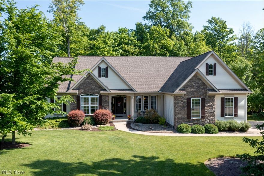 Stunning ranch-style home in a .76 acre corner lot in Westfield Center. Spacious, updated, open, bright & airy, and beautifully landscaped. A covered front porch welcomes you to this spectacular all-in-one floor home with 2416 Sq Ft of living space, character & charm. You will love the fantastic layout that flows throughout this three-bedroom home that features an open concept living formal dining room that leads to the great room and kitchen. The beautiful great room has a vaulted ceiling, engineered hardwood flooring, a lovely gas fireplace, and a wall of windows w abundant natural light & great views. An eat-in kitchen complete w stainless appliances, white cabinets, pantry, vaulted ceiling, breakfast bar accented by granite counters & beautiful tile backsplash, and a dinette area perfect for entertaining and holiday gatherings. A master bedroom w his/hers walk-in closet, and a master bath w double sinks, soaking tub & a tile/glass walk-in shower. The main floor is complete w an off