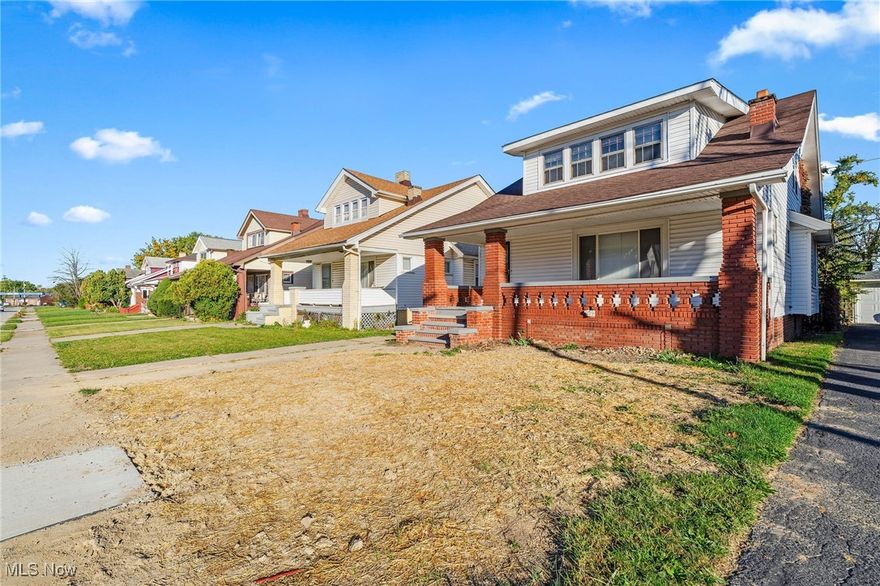 Charming Garfield Heights cape cod with classic curb appeal and a wide front porch, offering 3 bedrooms and 1.5 baths. Inside, hardwood floors flow through bright living and dining rooms accented by built-ins and a mirrored fireplace, while the updated eat-in kitchen features white cabinetry, a tile backsplash, and laminate countertops. Upstairs provides spacious bedrooms and the full basement delivers ample storage and flex space for a workshop or rec room. Long driveway and garage provide convenient off-street parking and easy access to the backyard. Centrally located near city amenities and commuter routes, 13501 Saybrook Ave is move-in ready with value-add upside for either an owner-occupant or a rental portfolio.