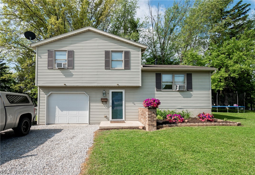 Welcome to 9 Holly Court! This 3 bedroom, 2 bathroom home is conveniently located on a quiet cul de sac street while still being near downtown restaurants and shops. The main level includes a living room, spacious kitchen and dining room with access to the backyard. The upper level offers a full bath and three good sized bedrooms. Oversized full bath with laundry area sits right off the garage with entry to lower and main levels. There is an extra living space on the lower level that can be used as a fourth bedroom. Beautiful shaded treelined backyard with newly built steps from the dining room. New HWT. Don't miss your opportunity to own this home. Schedule your private viewing today!