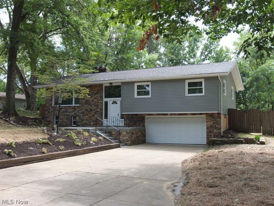 Updated and remodeled 3 bedroom, 2.5 bath home with living room and family room in quiet neighborhood! Living room with fireplace. Dinette with tile floor is open to the completely remodeled kitchen with tile floor, tile backsplash, breakfast bar and stainless steel dishwasher, oven and range. Master suite has double closets and private full bath with tile floor, new vanity and tile tub/shower. 2 additional bedrooms on the main level. Remodeled full bath with new vanity, tile tub/shower surround and tile floor. Lower level family room with fireplace and half bath too! Foyer has tile floor and lots of natural light. Fully fenced backyard with storage shed large deck, great for entertaining! Schedule an appointment to see all this updated home has to offer!