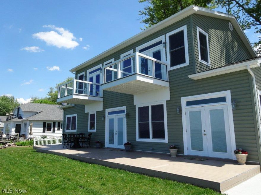 Breathtaking views of Lake Erie and the Conneaut Lighthouse! Some of the best views in the area!  This home was built in 2011 and no expense was spared.  Built with quality craftsmanship, this home has 10 ft ceilings and a very open feel.  There are 4 large bedrooms each with it's own full bath.  Two bedrooms are on the main floor and two are upstairs.  The upstairs bedrooms each have their own private balcony to enjoy both the sunrise and the sunset. The view from the bed makes you fell like you are floating on water.  Awesome!  There is also a half bath on the main floor.  The kitchen is huge with an abundance of cabinets and granite counters.  There is a view of the lake from every window in the home!  Three sets of french doors lead to a 500 SF Trex deck.  Just over a mile away, the Port of Conneaut offers fishing, boating, jet skiing, public launch ramps and picnic locations.  It is also one of the best wind surfing locations on Lake Erie. Great rental property! Owner financing av