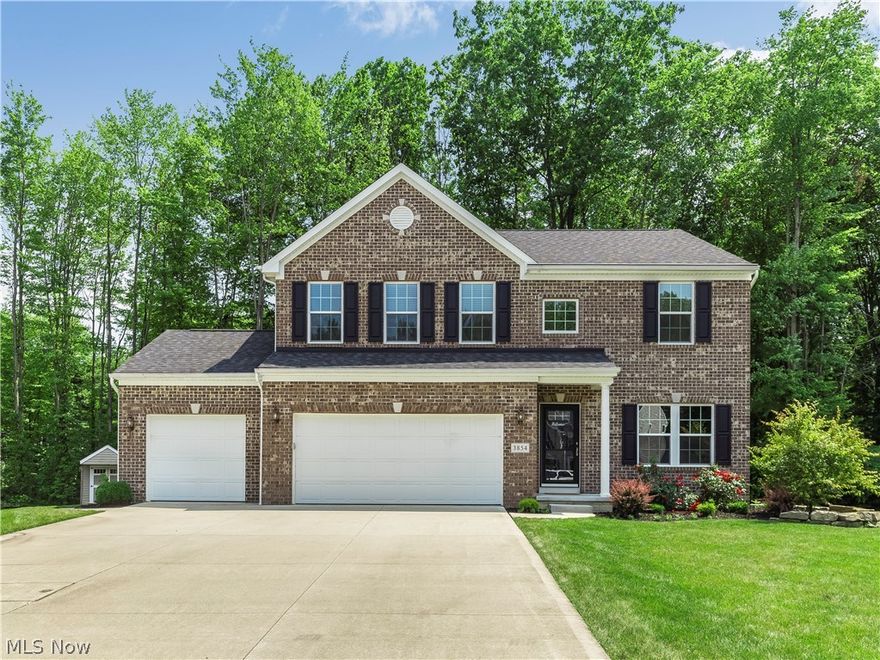 This is a beautifully maintained home and is located on a cul de sac. You won't want to miss the opportunity to live in a newer home built in 2012. There are 4 bedrooms and 2.5 baths. As you enter the home you will notice the beautiful hardwood floors in the living room. The open floor plan leads you to the great room with a gas fireplace. The eat-in kitchen has granite countertops and is perfect for entertaining. There is a bright morning room surrounded by windows to enjoy your morning coffee. There is a spacious deck that overlooks the woods as well. The shed in the backyard stays. The home has 4 bedrooms on the second level and two full baths. The bathrooms have all been updated with granite. The master bath features double sinks and a garden tub. There is also an upstairs laundry room for your convenience. The basement area is finished for extra living area. There is a second laundry area in the basement and utility room for extra storage. Lets not forget the rare 3 car garage! Yo