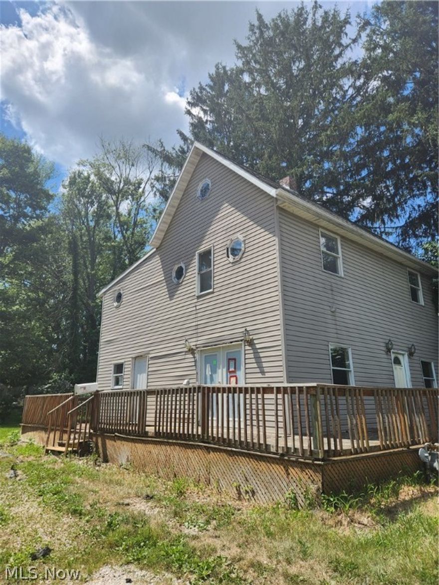 Colonial style home on 3 lots.
