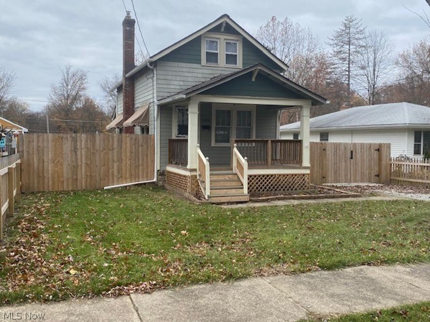 This seller has done it ALL for you!!  Just move in before the holidays and enjoy this adorable bungalow in the heart of Stow!!  Curb appeal galore with well maintained and freshly painted cedar shingle exterior plus a newly built front porch to enjoy!  You'll enter through the front door to the cozy living room with brand new laminate flooring!  A dining room perfect for seating 2-4 comfortably plus the owner added a breakfast bar, that you can use if you wish!  Completely updated first floor spacious bathroom!  The kitchen is updated featuring a farmhouse sink, oil rubbed bronze fixtures, brand new two tone cabinets, stainless steel oven and refrigerator and a new countertop!  Upstairs you'll find two large bedrooms with brand new gray carpet!  The backyard is a nice size and completely fenced in PLUS there's a two car detached garage!  Fencing gate goes across driveway for added privacy, too!  Other major updates include:  roof, furnace, hot water tank (2011); bath/kitchen/lvg/dinin