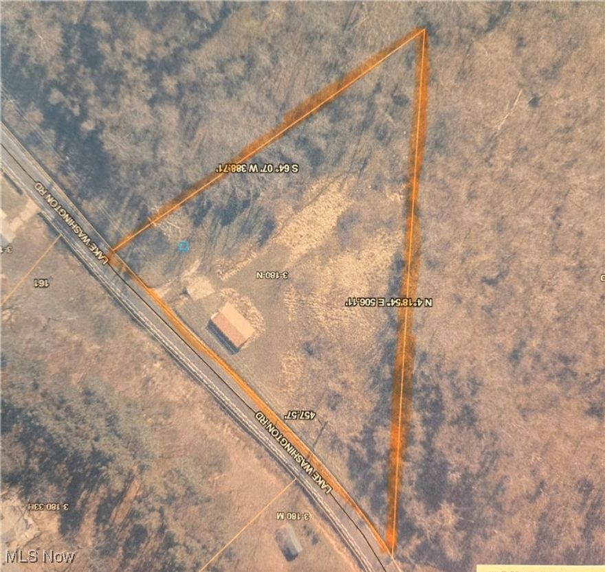 Nice land outside the city limits of  Parkersburg with public water, sewer in place. Ther gas meter removed when house was torn down.  The possibilities re endless for this this 1.95 acre parcel. this is an excellent location for a business, a modular or mobile home or build another home. Located a very short distance on Lake Washington Road just of Rt 68 in Lubeck.There is a garage on property as the home was removed. Would be an exellent location for a modular or mobile home or build another home.  The garage is 24x40 with new doors and at one time the back corner was used tto shelter a horse.  The large doors for horse have been closed with block. There is much additional land could be usable with removing trees and excavating.