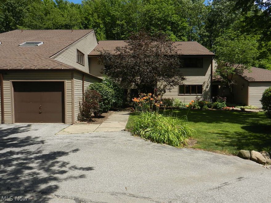 This Immaculate condo has so much to offer. Spacious and bright updated kitchen with an attached bar area, all appliances stay,large size pantry. Sun room off kitchen with a nice size sky light. Large Formal dining room with a newer chandelier.  Living room area with a sliding glass door to a private deck surrounded by tall mature trees.  Master bedroom with an updated full bath, walk in closet and sliding door to the private deck. Newer furnace and air conditioner 2013. Updated main bath, Neutral decor, move right in. Great location just minutes to Chagrin Falls Village or shopping in Bainbridge.