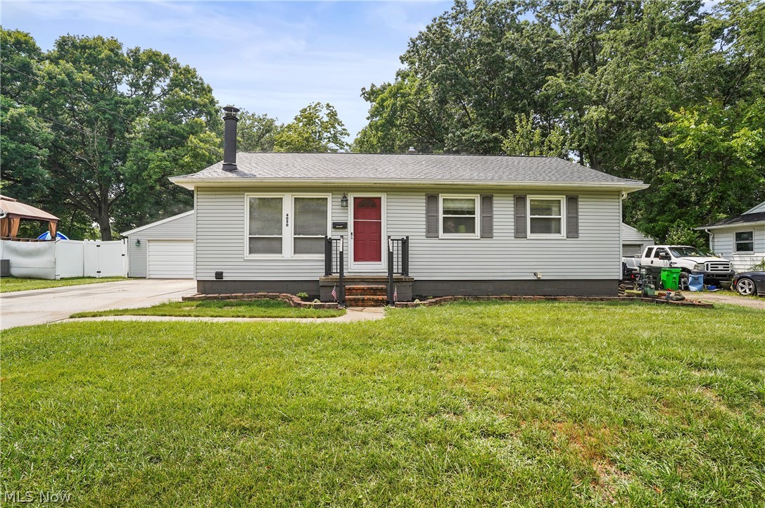 This charming 3 bedroom 1 and 1/2 bath Ranch maintained in excellent condition has several extra features that make it a true GEM! The exterior is crisp and clean, there's a newer roof and gutters and a wide concrete driveway leading to the 2 1/2 car garage with and extra side patio. The sparkling clean interior has hardwood floors throughout and a woodburner fireplace in the living room that adds warmth in the cold months. The open kitchen/dining area has newer kitchen appliances and a slider to the 24 x 20 three season room with cathedral ceiling and skylights. The neatly manicured backyard includes a firepit, a white vinyl fence and a 10 x 12 shed. The lower level has a full length rec room plus a separate office or workout room with closet and a 1/2 bath. Updates include:roof, gutters, electric panel box, furnace, AC, windows and doors, lateral sewer lines and sump pump. Home warranty included for extra peace of mind.