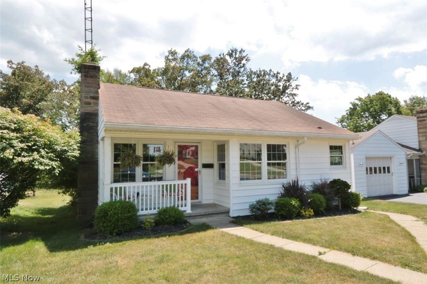 Nice one floor 2 bedrooms hardwood floors  , new oak kitchen cabinets with all newer lighting , large living room with fireplace ,all newer windows