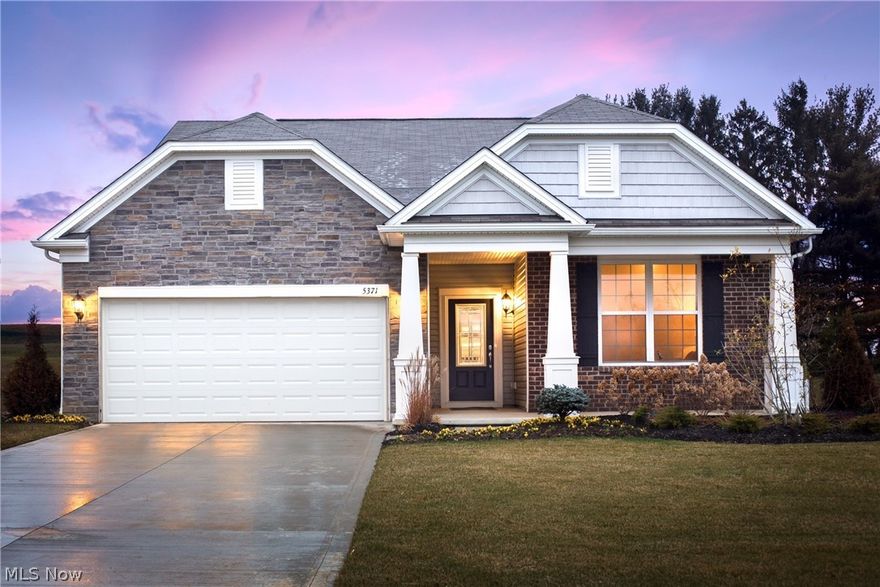 Stunning Forest Creek Model for sale!  Pulte Homes Ascend floor plan in Medina County’s most desirable limited maintenance community.  Located in York Township with low, low property tax rates and no city or RITA income tax! Enjoy private homesite backing to a beautiful grassy hill, sky line, and trees with gorgeous views!  Numerous upgrades in this model home include a stone and brick exterior front porch and back patio located off of a sunroom with plenty of windows for lots of natural light!  Upgraded kitchen includes staggered maple cabinets, granite and stainless steel appliances including a café style refrigerator.  Upgraded hard surface flooring throughout and a stunning stone fireplace in the gathering room!  Recessed can lights throughout the home and 9 foot ceilings bring warmth throughout this gorgeous open floor plan home!  All the landscaping is complete with shrubs, flowers, sod, mulch and an irrigation system!  And, finally a 3-car insulated and painted garage with plent