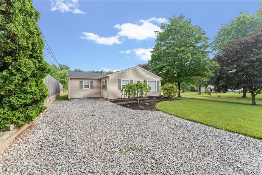 Welcome to this beautifully remodeled Springfield Twp. ranch. It's a move-in ready gem waiting for you! Situated on a spacious half-acre lot, this fully remodeled 4-bedroom, 2-bath ranch blends comfort, modern style, and room to grow—inside and out. Step inside to a bright, open layout featuring a stunning eat-in kitchen with new countertops, updated cabinetry, a sleek tile backsplash, and contemporary finishes throughout. The kitchen and living areas flow effortlessly—ideal for entertaining or relaxing at home. Unwind in the large family/great room showcasing vaulted ceilings and a cozy fireplace, creating the perfect space to gather with loved ones or enjoy a quiet night in. Fresh paint and new matching LVP flooring run throughout the home, offering a clean, cohesive look. The versatile carport offers covered parking in cooler months and doubles as a shaded patio in warmer weather—great for outdoor dining, entertaining, or enjoying your morning coffee. The expansive backyard provides plenty of space for kids or pets to play, gardening, or weekend barbecues. A storage shed adds even more convenience. Whether you're right-sizing, buying your first home, or simply looking for the ease of single-level living in a peaceful setting—this home checks all the boxes. Don't miss your chance—schedule a private showing today!