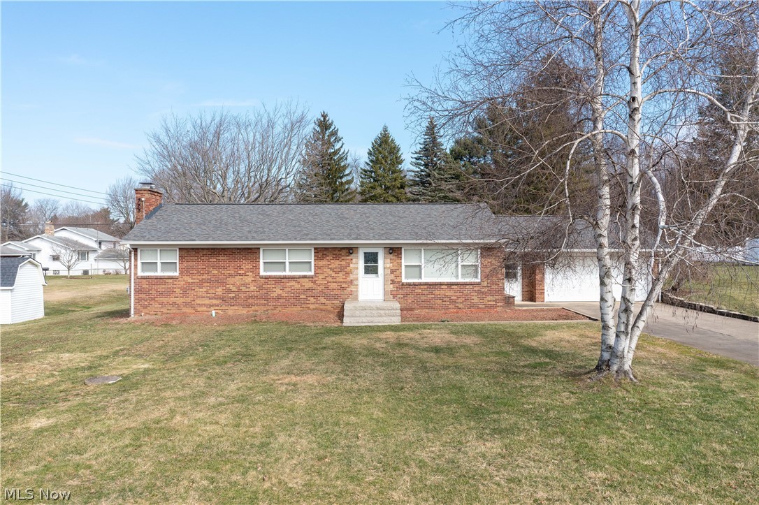 This all brick ranch is well-maintained and a great starter home in Clearview Estates in Springfield, Twp. Pride of ownership here, this lovely home sits on .60 acres with 1,682 sq ft of living space. The living room is bright and spacious, with large windows & an abundance of natural light. The eat-in kitchen includes appliances, a tile backsplash, lots of cabinets & countertop space, and a dinette area. There are three bedrooms, a full bathroom with a large vanity/countertop, and a linen closet to complete the main floor. Relax and enjoy in the recreation room with a lovely wood-burning fireplace in the partially finished basement, that also offers a full bathroom with a walk-in shower, glass block windows, an ample walk-in Cedar closet (13x6), a laundry area with a utility sink, and plenty of storage space. The oversized (25x22) attached two-car garage has a workshop area and access to the concrete patio and private backyard. Updates include (2020-2021) a new roof & front gutter, ne