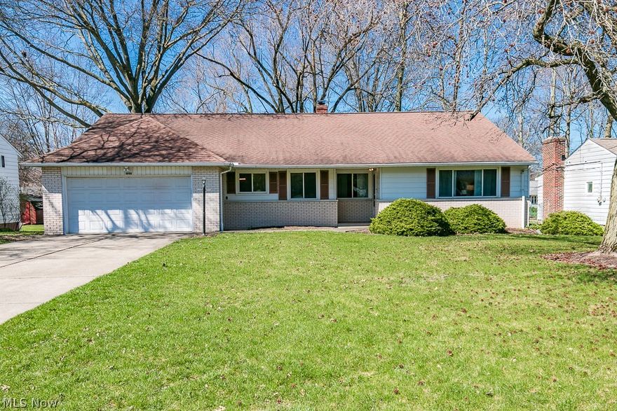 Welcome to easy living in a desirable location within Highland Heights! This charming split-level, nestled on a picturesque street, offers an irresistible blend of comfort and elegance. Step inside to discover a freshly rejuvenated interior, boasting all-new neutral paint throughout, creating a bright and inviting atmosphere. The heart of the home, the large eat-in kitchen, is a chef's delight with plenty of cabinets and all appliances including a new range, ensuring both style and functionality. Adorned with gorgeous hardwood floors that flow seamlessly throughout, each step exudes luxury and warmth. Retreat to the master suite, where indulgence awaits with a full bath featuring newer travertine flooring. The generously sized bedrooms offer ample closet space, providing rest and relaxation. Entertainment awaits in the lower level rec room, where a cozy fireplace and sliding glass doors leading to a covered patio beckon you to unwind and entertain in style. Outside, the sprawling backyard, now boasting new landscaping, is fenced-in and perfect for children and pets to roam freely. But the upgrades don't stop there! This home also features brand-new light fixtures throughout, including in the bathrooms, adding a touch of modern sophistication. Plus, enjoy the convenience of new leaf-guard gutters and a new washer and dryer that stay with the house. Meticulously maintained and thoughtfully upgraded, this home is truly a rare find. Don't miss your chance to make it yours and start creating unforgettable memories in this remarkable sanctuary. Welcome home!