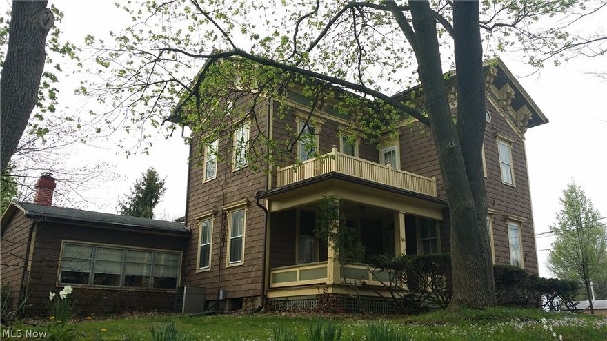 An abundance of character is found in this century home located in the heart of Smithville.   Home features large rooms with high ceilings, family room addition with cathedral ceilings and wood burner,  open kitchen and dining area, first floor laundry, and two full baths and three large bedrooms with a lot of storage.  Master bedroom offers a unique walk-out patio on the second level of home.  Outside yard is fully fenced, beautifully landscaped and full of color and includes a large shed.  Home is being sold as is and owner is highly motivated.  A little work to this home and it could be a stand out beauty!