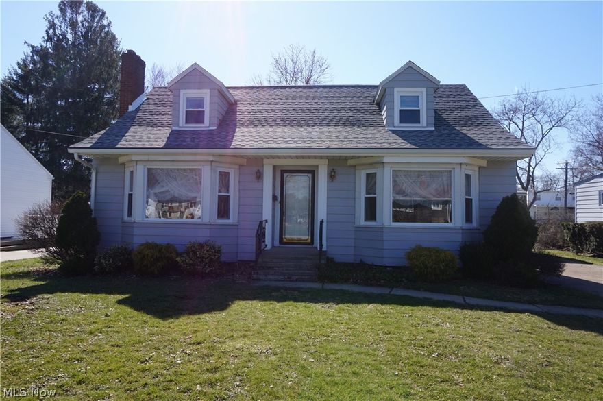 Picture perfect CLASSIC CAPE COD on quiet dead end street. Entertain in lovely formal living/dining rooms each with bright bay window. Gather around cozy brick living room gas fireplace. Enjoy large honey oak country kitchen and paneled 18x20' family room. One bedroom and full bath on main level, 2 dormer bedrooms with full bath on 2nd level. Full dry basement (lifetime waterproof warranty). Attached garage with attic storage, sloping yard offers private patio, garden shed. Lots of updates: vinyl windows 2002, furnace/H2O tank 2006, roof 2015, kitchen sink/disposal/range 2018, electrical panel 2019. Call now for your private showing!! Your dream home awaits!!